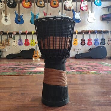 bongo: Djembe Material:Mahogany Ünvan:Nizami 42 (Daxili işlər nazirliyin — 2