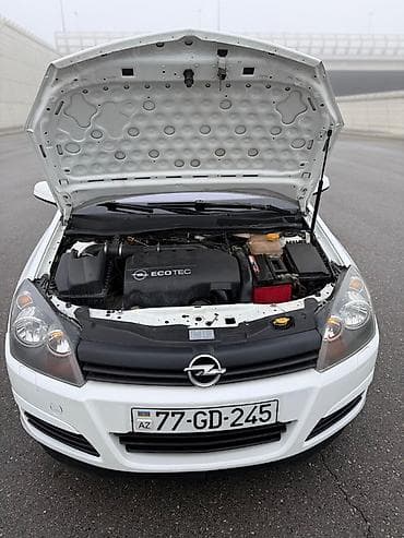 elektrikli moped: Opel Astra H Caravan (Universal), ağ rəng Texniki xüsusiyyətlər və — 10