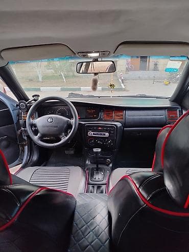 teker niva: Model: Opel Vectra B sedan Rəng: Mavi metalik Kuzov: 4 qapı, tünd — 2