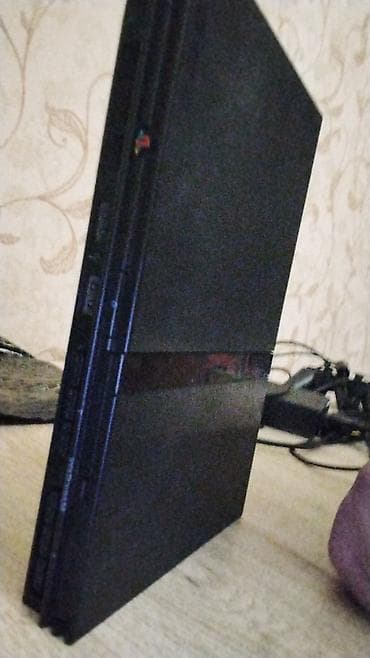 Xbox One: PlayStation 2 Slim oyun konsolu Xüsusiyyətlər: - Kompakt “Slim” — 1