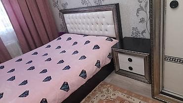 İkinəfərlik çarpayı