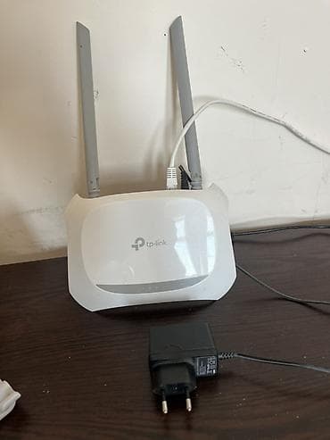 tp link azerbaycan: UltraNet internet xidməti və TP-Link Wi‑Fi router paketi 60-100 metr — 2