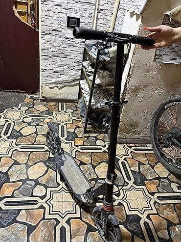 Самокаты: Şəhər içi rahat hərəkət üçün iri təkərli şinli skuter. Xüsusiyyətlər — 2