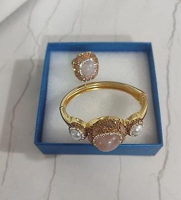 aqat daşı: Qızılı rəngdə qolbaq və üzük dəsti təbbi daş yenidi istifadə olunmayıb — 2