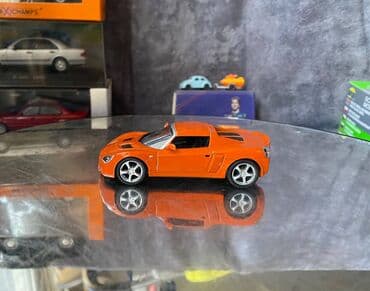 metbex tavan modelleri: Коллекционная модель Opel Speedster orange 2000 DeAgostini Art  — 1