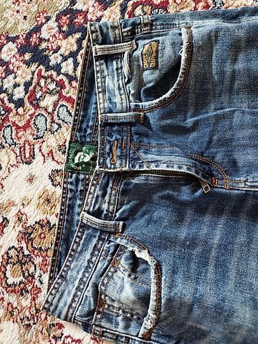 Верхняя одежда: Cins şalvar.28razmer.şəkilde var razmeri.almanyadan alınıb.bir necə — 2