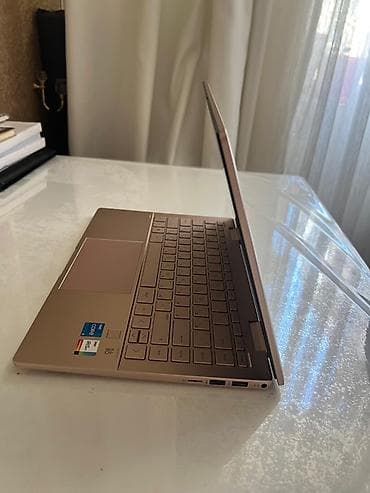 HP: HP Pavilion x360 2-in-1 noutbuk satılır. Sensor ekranlıdır və 360° — 4