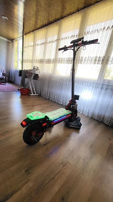 ucuz gitara: Elektrik skuter – TOMI brendi Xüsusiyyətlər: - Güclü ikili — 9