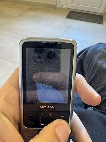 windows telefonlar: Nokia 6700 Slide, rəng - Gümüşü, Düyməli — 2