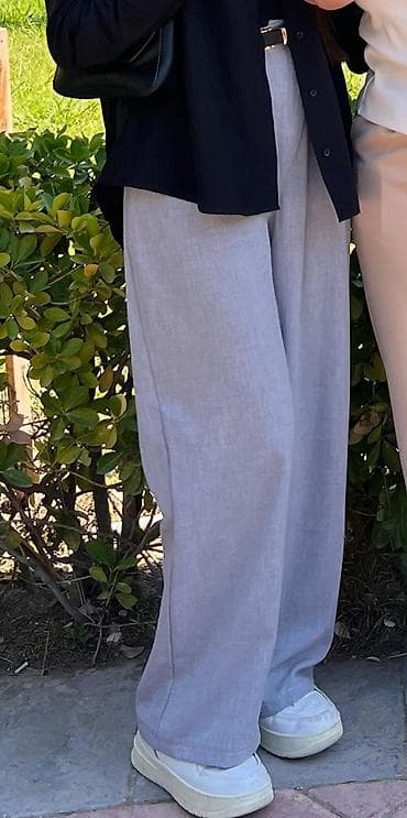Geniş kəsimli, açıq boz rəngdə qadın şalvar. - Kəsim: Yüksək belli