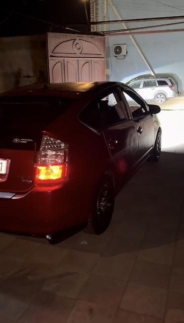 opel astra 1998: Toyota Prius (II nəsil) hibrid liftbek - Rəng: tünd qırmızı — 2