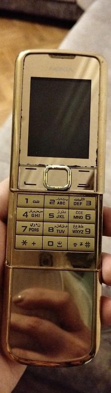 Nokia < 2 GB Memory Capacity, rəng - Qızılı, Düyməli, İki sim kartlı
