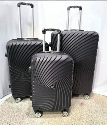 Maskalar, eynəklər: Fərqli ölçülərdə üç ədəd qara rəngli səyahət çantası dəsti. Hər bir — 2