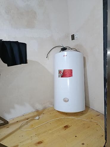 dus kabina: Elektrik su qızdırıcısı (boiler), silindrik şaquli gövdə, ağ rəng. - — 3
