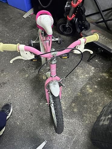 Uşaq geyimi və ayaqqabıları: Uşaq velosipedi – Trinx, çəhrayı Xüsusiyyətlər: - Təkər ölçüsü — 2