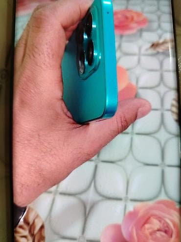 asus telefon qiymeti: Məhsul: Mavi rəngli smartfon Xüsusiyyətlər və dizayn: - Kənarları — 6