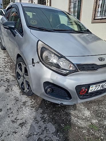 tofas masin: Kia Rio: 1.4 l | 2011 il Hetçbek — 5