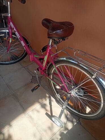 руль для велосипеда: Uşaqlar üçün çəhrayı rəngdə Stels markalı velosiped. Bu model gənc — 4