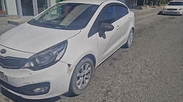 Nəqliyyat: Kia Rio: 1.4 l | 2014 il Sedan — 2