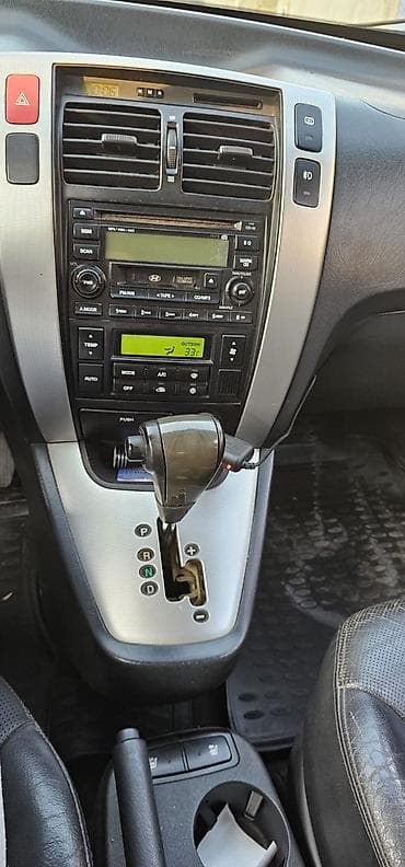 teker 19: Hyundai Tucson: 2.7 l | 2006 il Ofrouder/SUV — 10