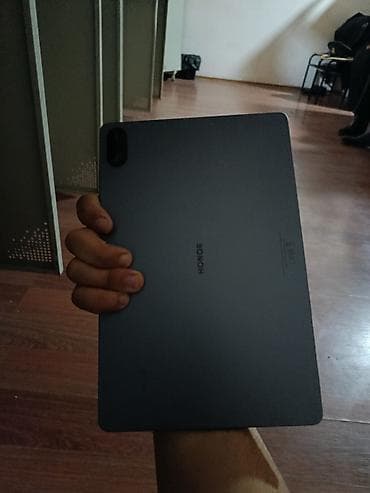 modio tablet: Planşet – nazik metal gövdə, tünd boz rəng - Təxmini 10–11 düym tam — 6