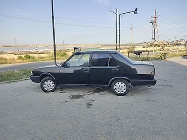 Model: Tofaş Şahin (sedan) Rəng: Qara Kuzov: 4 qapı, arxa ötürücü — 6
