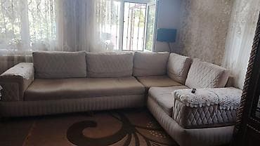 divan damla: L‑formal künc divanı – krem rəngdə, yumşaq parça üzlük. - L‑şəkilli — 1