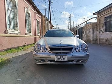 Mercedes-Benz 240: 2.4 l | 2001 il Sedan