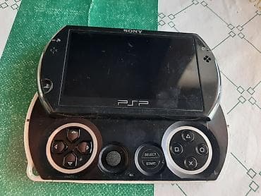 memo cx: Sony PSP Go (PSP-N100x) əl konsolu - Sürüşdürülən dizayn: ekran — 1