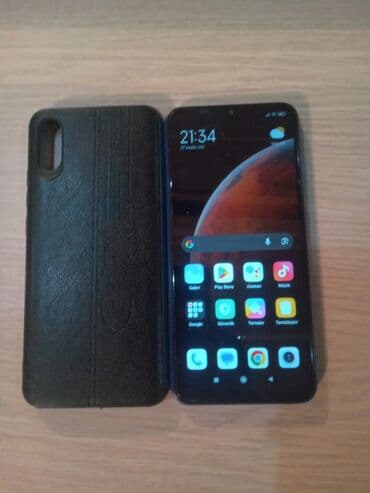 rəsmi 9 s: Redmi 9a mavi rəng, sensor -32gb 2ram - 2 sim kartlı - 32mp kamera — 5