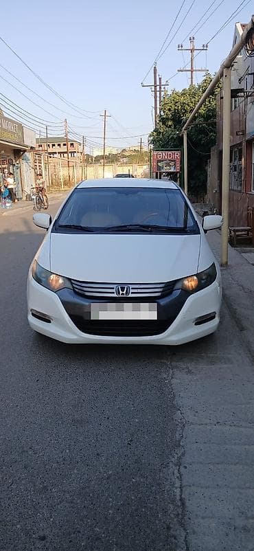 Honda Insight: 1.3 l | 2011 il Hetçbek