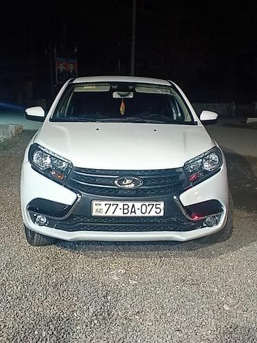 vaz cixollari: Lada Vesta Cross, ağ rəngli hatchback/sedan tipli kuzov. Texniki və — 1