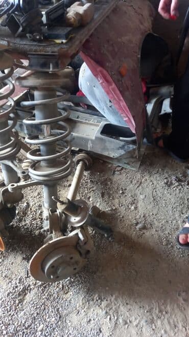 Avtomobil ehtiyat hissələri, o cümlədən amortizator, yay, əyləc diski