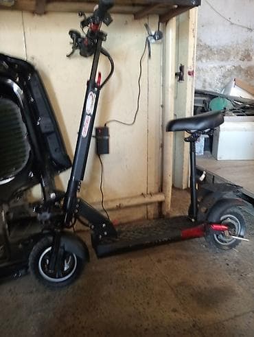 electro gitara: Sukuter 48 v lik özumundu hcbir problemi yoxdu 30 kilometir tam verir — 1