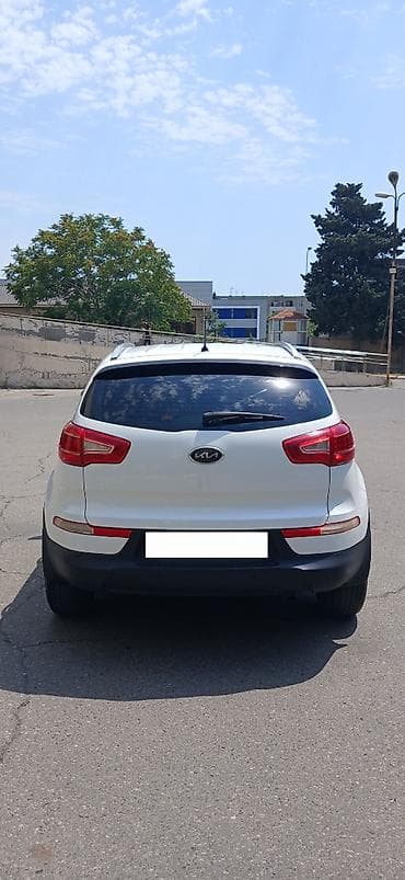Kia Sportage: 2 л | 2013 г. Внедорожник — 2