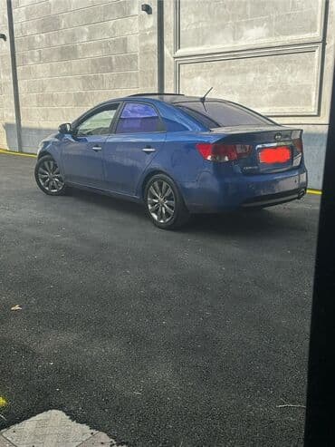 Yağlar və avtokimyəvi maddələr: Kia Cerato: 2 l | 2009 il Sedan — 1