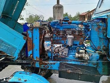 muhərrik velosiped: Mavi rəngli təkərli traktor – kabinəli, ön faralar və siqnal işıqları — 2