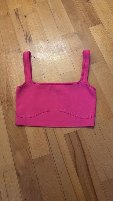 Məhsul: Qadın idman topu / bra - Rəng: Parlaq çəhrayı - Dizayn: Düz