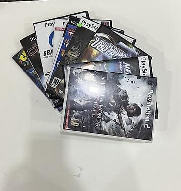 ps2 gta: PlayStation 2 Slim satılır. Tam işlək vəziyyətdədir. Komplektə 2 ədəd — 2