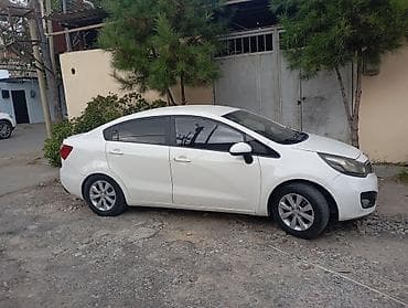 ravon r4 lizing: Kia Rio: 1.4 l | 2012 il Sedan — 4