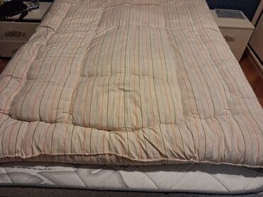 Böyüklər üçün İşlənmiş Yun Döşək, Ünvandan götürmə