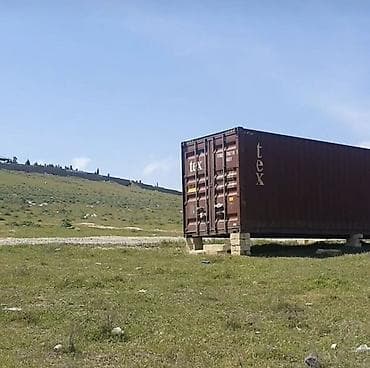 konteyner satilir: Mühandis İnstitutundan Novxanı yeni salınmış yolun kanarında — 2