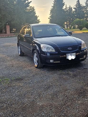 changan star 2: Kia Rio hatchback – qara rəngli, 5 qapılı şəhər avtomobili. Texniki — 1