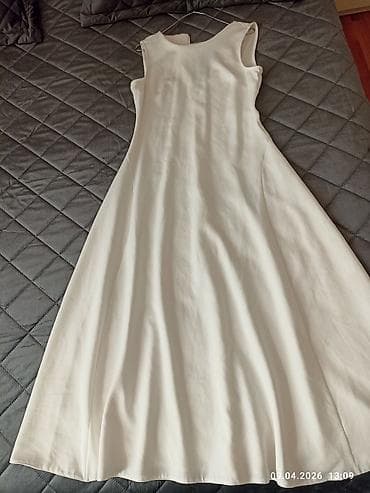 Ağ rəngdə qadın paltarı – klassik və zərif dizayn. - Model: qolsuz lalafo.az -da Ağ rəngdə qadın paltarı – klassik və zərif dizayn. - Model: qolsuz