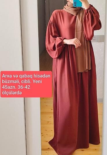 - Qadın uzun paltar 36-38, 40, 42 ölçüləri var