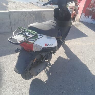 Proton: X-ROAD skuter - Rəng: ağ/qara - Korpusda “X-ROAD” loqosu - 2 nəfərlik — 5