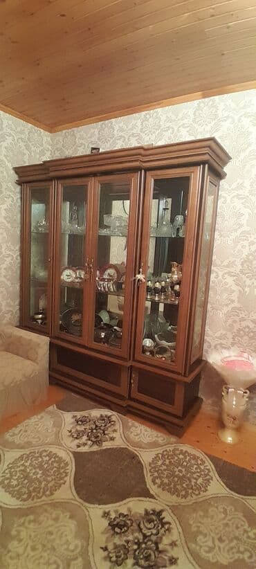 Şüşəli dolab vitrini, İşlənmiş, Ünvandan götürmə