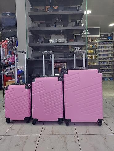 Çamadanlar: Sərt korpuslu çamadan dəsti – 3 ədəd - Rəng: açıq çəhrayı - Korpus — 1