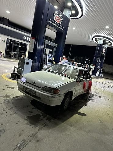 qalofqa vaz: Avtomobil: Lada Samara (VAZ 2114) hatchback, ağ rəng Kuzov: 5 qapılı — 2