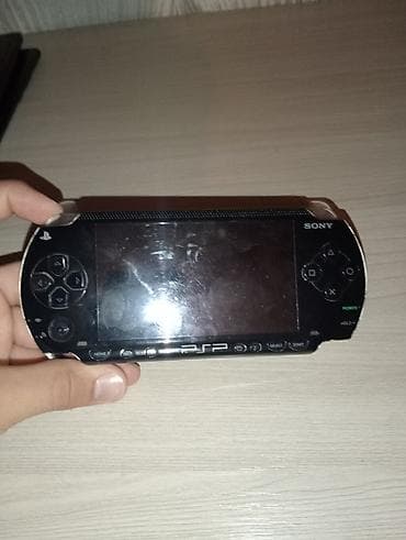 ghost of: Sony PSP-1000 (Fat) + Şarj aparatı + Oyunlar Əla vəziyyətdə işləyən — 6